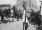 General Gouraud lays a palm at the dedication of the cemetery in 1930.
